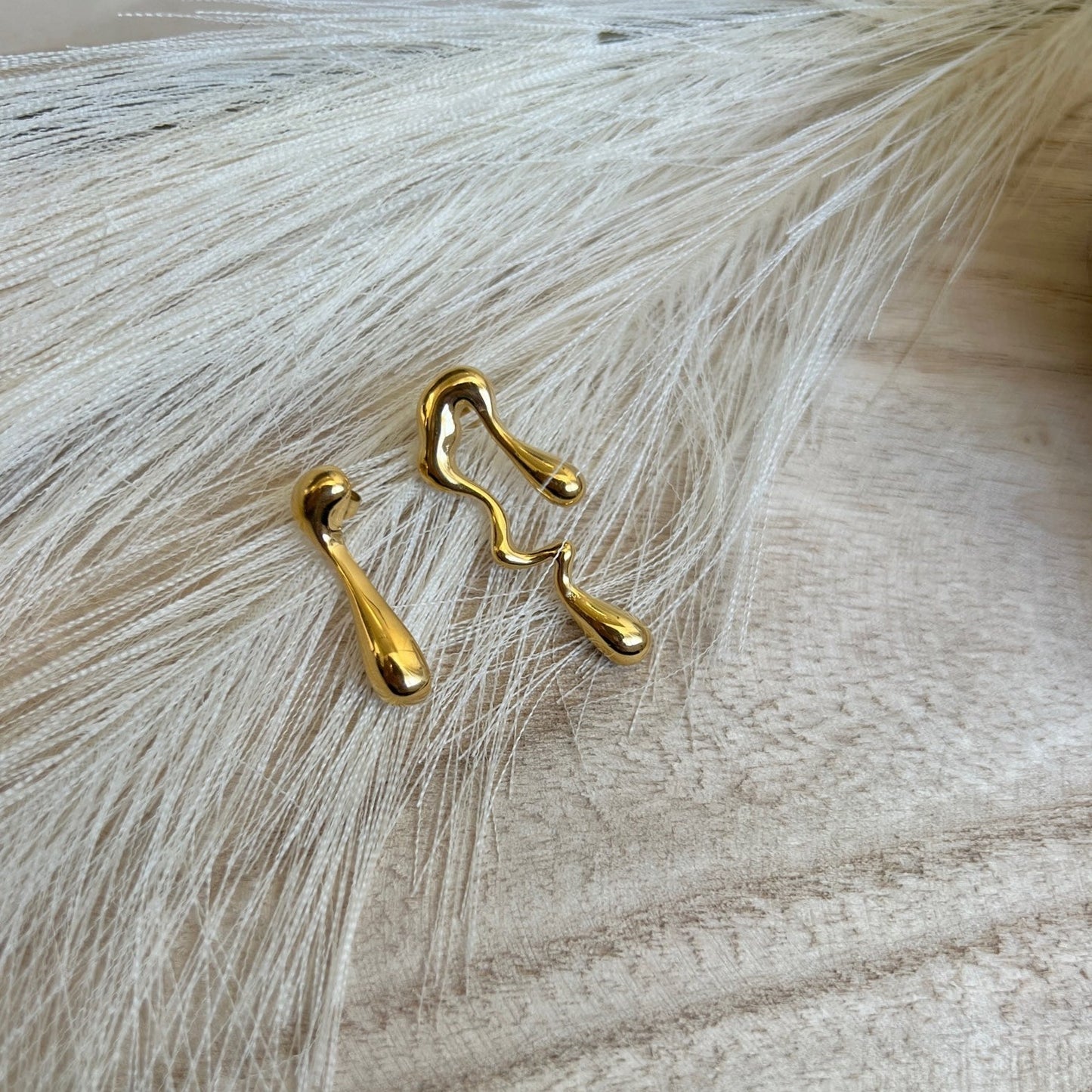 ASYMMETRICAL EARRINGS